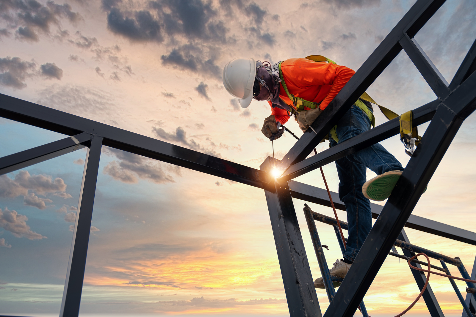 person working on steel frame